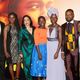 (L to R) Robert Katende and Phiona Mutesi, who are portrayed in “Queen of Katwe” pose along with director Mira Nair, actor Madina Nalwanga, Lupita Nyong’o, David Oyelowo and actor Martin Kabanza during its Los Angeles premiere in Hollywood in 2016.